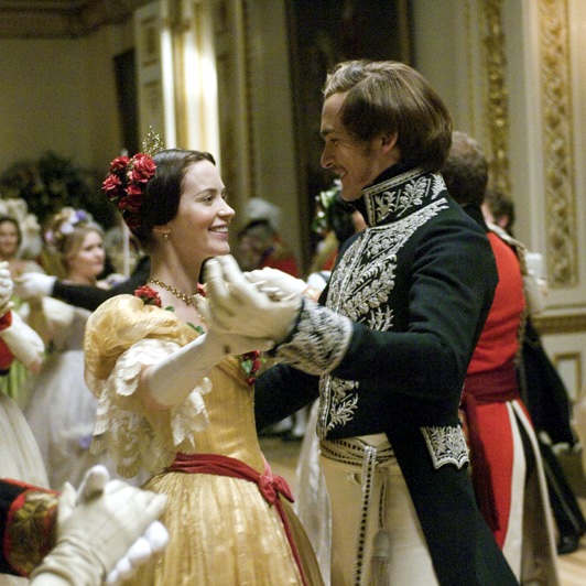 Victoria (Emily Blunt) and Albert (Rupert Friend) dancing.